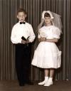 Daniel and Diane are baptized at age 8