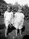 Sisters Dorothy and Florence stand together outside
