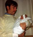Jessica held by her father Douglass