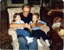 Ray reads a story to his grandchildren Amy and Andrew