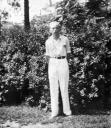 Andrew Dominik stands in front of a hedge in Phoenix, Arizona circa 1960