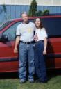 Lenny poses with Diane in front of her van