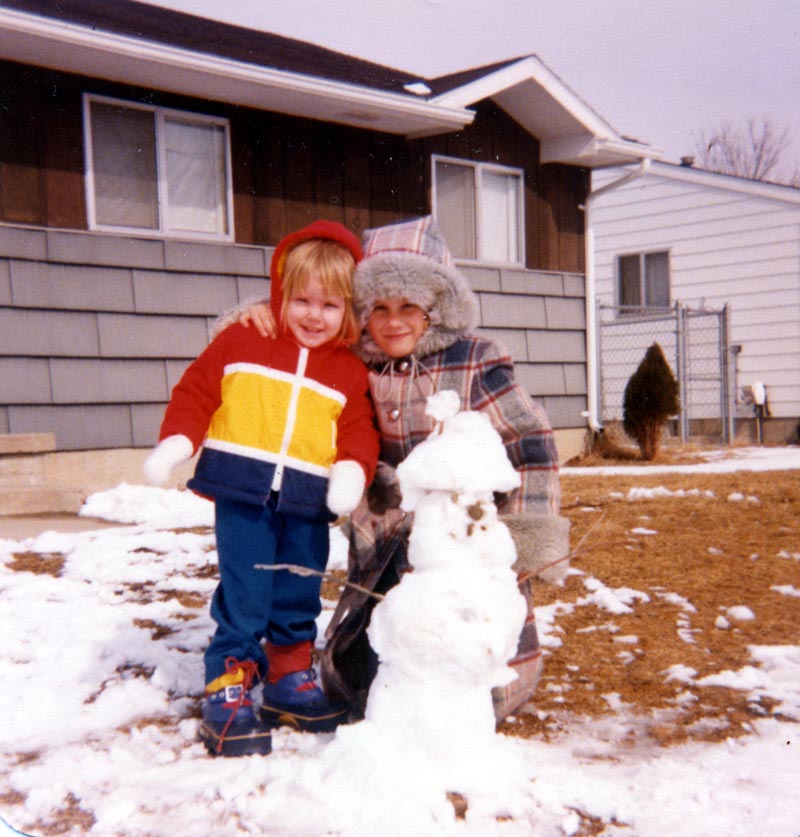 Me and my sister with our snowman Me and my sister with our snowman