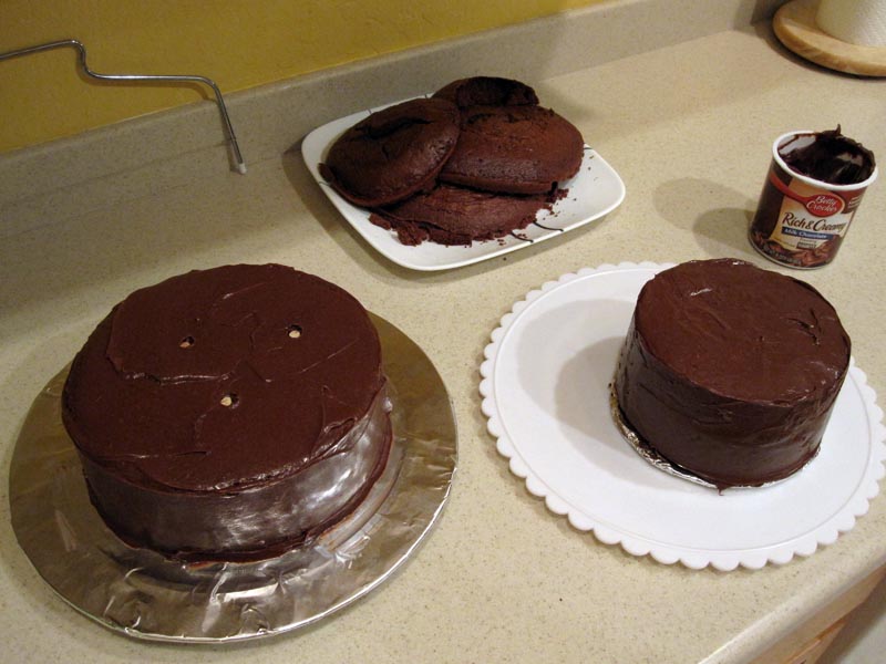 Two tiers of iced cakes, ready for decorating Two tiers of iced cakes, ready for decorating